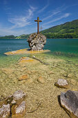 Kreuzstein, rock with cross at the banks of lake Mondsee, Upper Austria, Austria, Europe