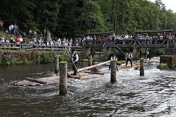 Men in traditional costumes on a raft, Timber rafting festival, Altensteig, River Nagold, Northern Black Forest, Baden Wurttemberg, Germany, Europe