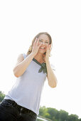 Laughing young woman, Old Danube, Vienna, Austria