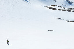 Backcountry skier ascending from Landfriedtal to Gruberscharte, Dachstein Mountain, Steiermark, Austria