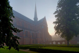 The minster and ruin of the cloister in the fog, Bad Doberan, Mecklenburg Western Pomerania, Germany, Europe