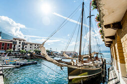 Ships in Malcesine harbour, Lago di Garda, Province of Verona, Northern Italy, Italy