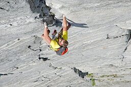Elijah Weber rock climbing a route called the Regular Route which is rated 5,6 and located on Slick Rock near the city of McCall in the Salmon River Mountains of central Idaho