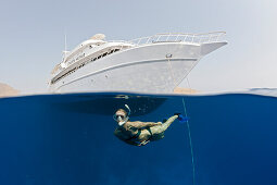 Snorkeler and Liveaboard, Zabargad, Red Sea, Egypt