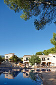 Ducal suites and large hotel pool, Punta Negra H10 Hotel, near Portals Nous, west of Palma, Mallorca, Balearic Islands, Spain