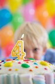 Four year old boy celebrating his birthday