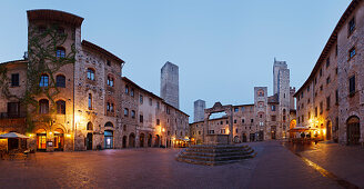 Towers and fountain on Piazza della Cisterna square, San Gimignano, hill town, UNESCO World Heritage Site, province of Siena, Tuscany, Italy, Europe