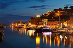 Illuminated marina at the Bruna river mouth, Castiglione della Pescaia, seaside town, Mediterranean Sea, province of Grosseto, Tuscany, Italy, Europe