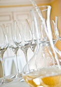 Empty white wine glasses and decanter, Hamburg, Northern Germany, Germany