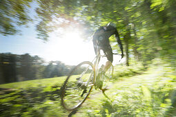 Man cyclocross touring in autumn, Oberambach, Munsing, Bavaria, Germany