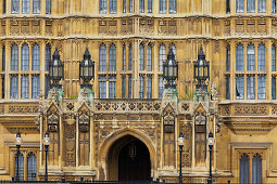 Entrance to the Westminster Palace with street lights, London, England
