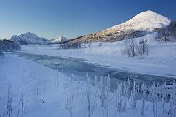 Winter landscape near Leknes, Lakselva river, Holandsmelen mountain, Vestvagoya, Lofoten, Nordland, Norway