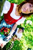 Couple in an apple tree, Styria, Austria