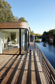 Terrace of a house boat on the Eilbek canal, Hamburg, Germany