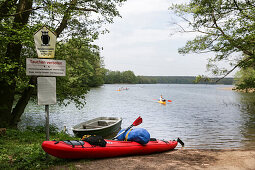 Canoeing on lake Krueselinsee, Feldberger Seenlandschaft, Mecklenburg-Western Pomerania, Germany