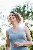 Smiling woman walking outdoors