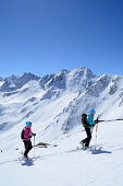 Two female backcountry skiers ascending to Gleirscher Rosskogel, Pforzheim Hut, Sellrain, Stubai Alps, Tyrol, Austria