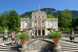 People ascending the steps to Linderhof castle, Linderhof castle of King Ludwig II of Bavaria, rococo, Ammergau range, Bavarian Alps, Upper Bavaria, Bavaria, Germany