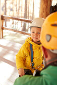 Boy in a high ropes course, Vernagt am See, Schnals Valley, South Tyrol, Italy