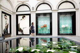 Woman window shopping, Via Montenapoleone, Golden Triangle, Milan, Lombardy, Italy