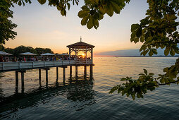 Pavilion with bar on the shore of Lake Constance at sunset, Bregenz, Vorarlberg, Austria