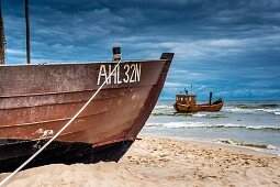 Two Fishing boats at the beach of the Baltic Sea, near the pier of the Baltic Sea resort of Ahlbeck, Municipality of Heringsdorf, Usedom Island, County Vorpommern-Greifswald, Mecklenburg-Western Pomerania, Germany, Europe, No Property Release available!