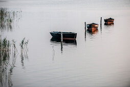 Sunset and fishing boats on the island of Ummanz, island of Ruegen, Mecklenburg-Western Pomerania, Germany