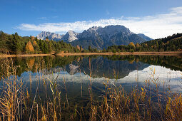View over lake Luttensee to the Karwendel mountains, near Mittenwald, Bavaria, Germany