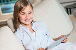 Girl using an iPad, Hamburg, Germany