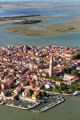 Aerial view of the Venetian Lagoon with salt marshes, Island of Burano, Fishing village with colourful house facades, Veneto, Italy