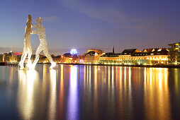 Illuminated artwork Molecule Man above the river Spree, artist Jonathan Borofsky, Berlin, Germany