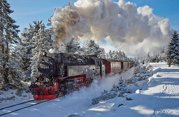 Brocken steam train in a Winter landscape, Harz, Saxony-Anhalt, Germany