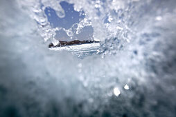 View through a breaking wave, Jakarta, Java, Indonesia