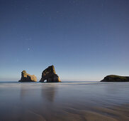 Archway Islands in moonlight, Wharariki Beach, Tasman, South Island, New Zealand
