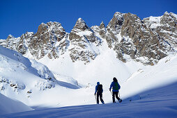 Two female backcountry skiers ascending to Kuhscheibe, Stubai Alps, Tyrol, Austria