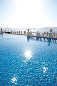 View over a hotel pool to the Bosphorus, Istanbul, Turkey