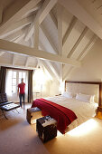 Woman in a hotel suite, Adelboden, Canton of Bern, Switzerland