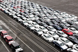 New cars on a parking area awaiting shipping in Bremerhaven, Bremen, Germany