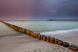 Groynes on the beach in the evening, Zingst, Darss, Baltic Sea, Mecklenburg-Vorpommern, Germany