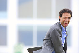 Businessman with smartphone business center. San Sebastian Technology Park. Donostia. Gipuzkoa. Basque Country. Spain.