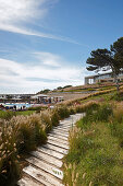 Wooden boardwalk to Martinhal Beach Resort & Hotel, Sagres, Algarve, Portugal, southernmost region of mainland Europe