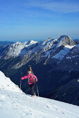 Female back-country skier ascending to Birkkarspitze, Karwendel range, Tyrol, Austria