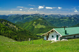 Alpine hut with Kranzhorn and Bavarian Alps in background, Spitzstein, Chiemgau Alps, Upper Bavaria, Bavaria, Germany