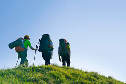 Three hikers, Blauberge, Bavarian Prealps, Upper Bavaria, Bavaria, Germany