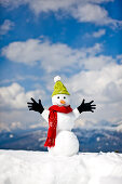 Snowman wearing cap, scarf and gloves, Kreischberg, Murau, Styria, Austria