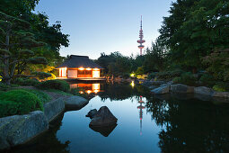 Teahouse in the japanese garden, television tower in the background, Planten un Blomen, Hamburg, Germany