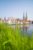 View over river Trave to historic city with Lubeck Cathedral, Lubeck, Schleswig-Holstein, Germany