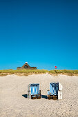 Beach chairs and thatched house, Kampen, Sylt Island, North Frisian Islands, Schleswig-Holstein, Germany