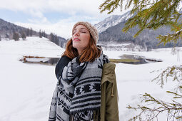 Young woman with closed eyes, Spitzingsee, Upper Bavaria, Germany