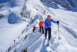Three persons ascending on a ridge towards Kleiner Kaserer, Kleiner Kaserer, valley of Schmirn, Zillertal Alps, Tyrol, Austria